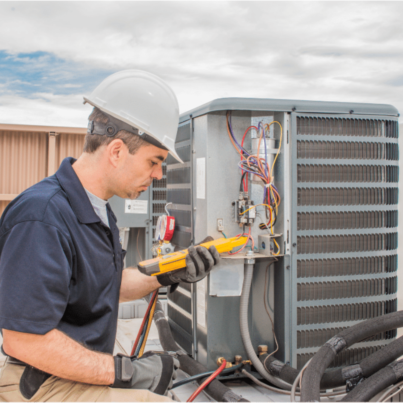 Stratford HVAC Pros HVAC technician servicing a system